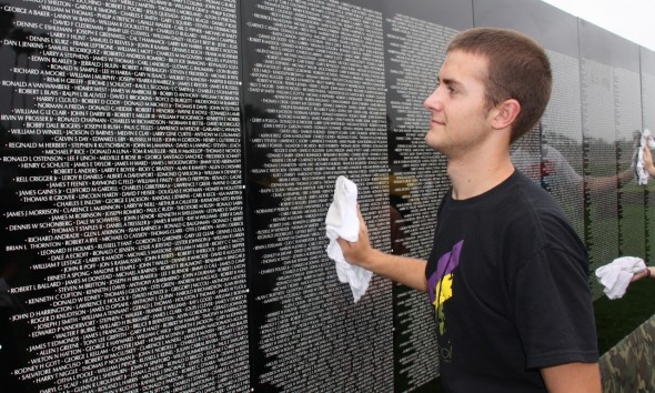 Anacapa students help assemble the Moving Wall