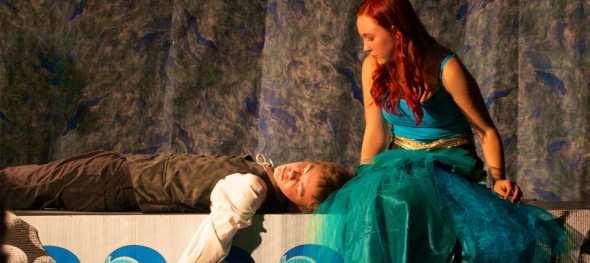Anacapa sophomores Rufus O'Dea and Lottie Johnston as Prince Erik and Ariel meet on the "beach" at opening night of "Disney's The Little Mermaid."