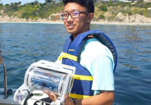 Wes, 10th grade, holds the OpenROV.